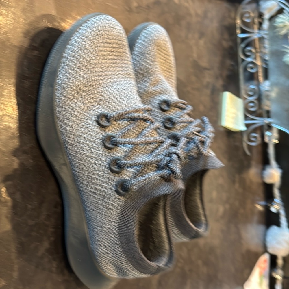 Gently used allbirds athletic shoes.
